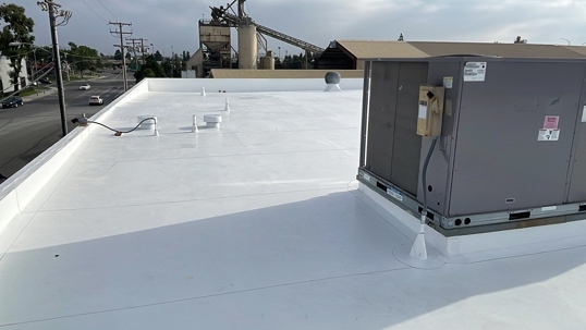 Finished commercial cool roof — Avatar Machine, Fountain Valley, CA (IB PVC by BYLTup).